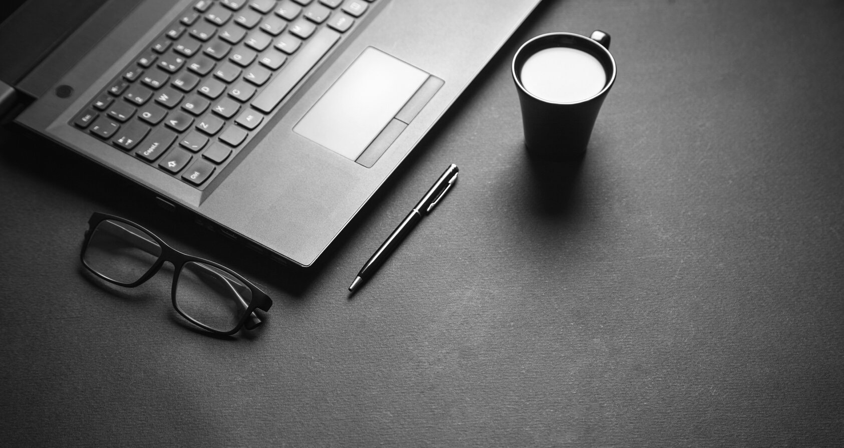 Business Objects on Black Desk.